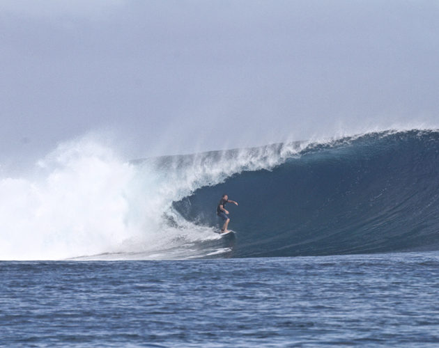 surfing at Matanivusi Surf Resort