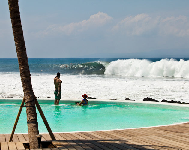 Kermas surf break infront of the beachfront pool at Komune Bali Indonesia Surf Resort