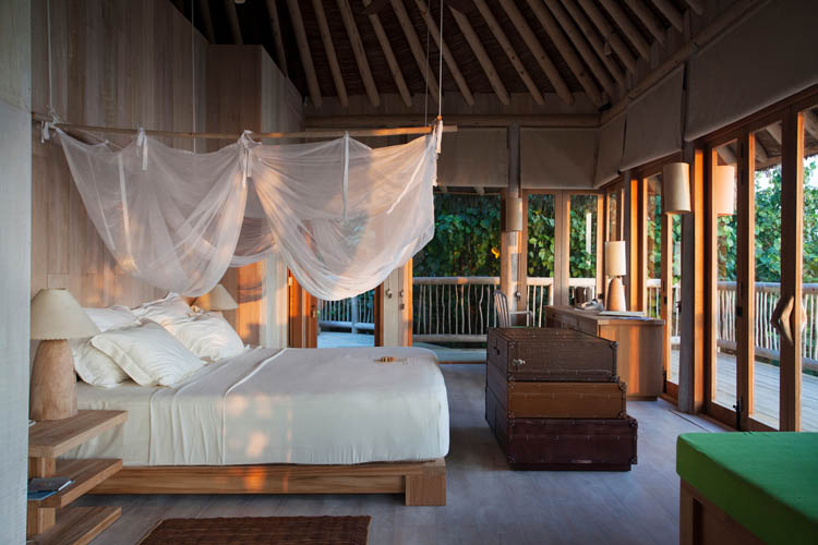 Wayfarers Atlas Soneva Fushi Maldives sunrise villa bedroom. The perfect family-friendly or group surf holiday destination
