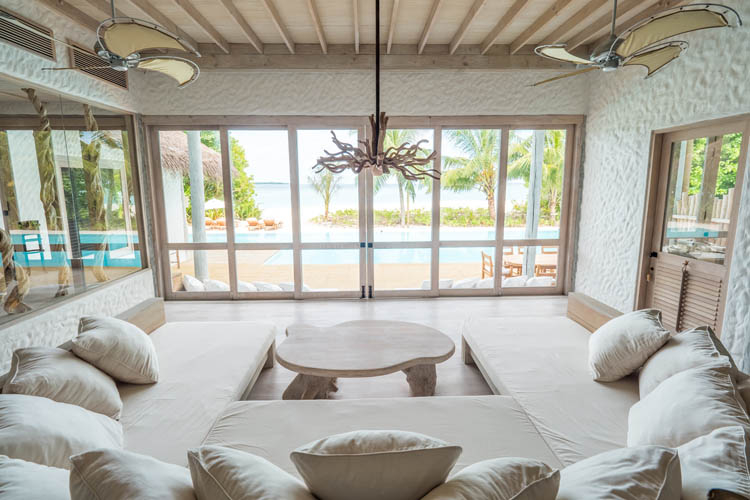 Wayfarers Atlas Soneva Fushi Maldives villa One lounge. The perfect family-friendly or group surf holiday destination