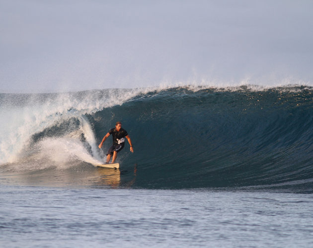 Surfer at Six Senses Malolo Fiji