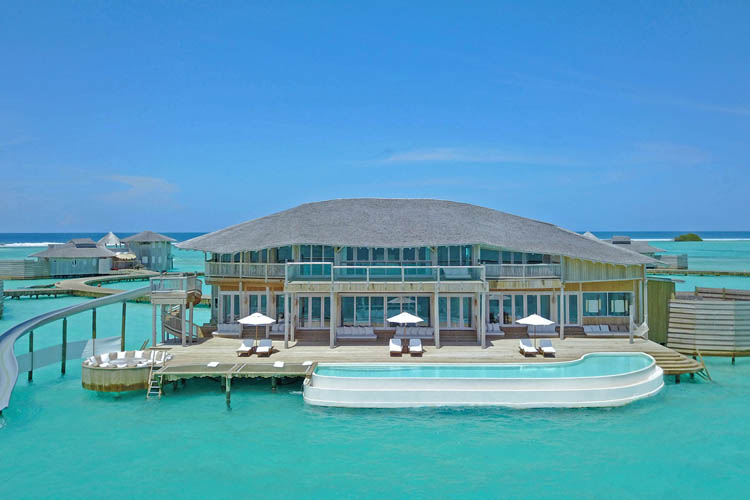 Wayfarers Atlas Luxury Family Surf Resort Soneva Jani Resort exterior of 4 Bedroom Water Reserve with pool and slide