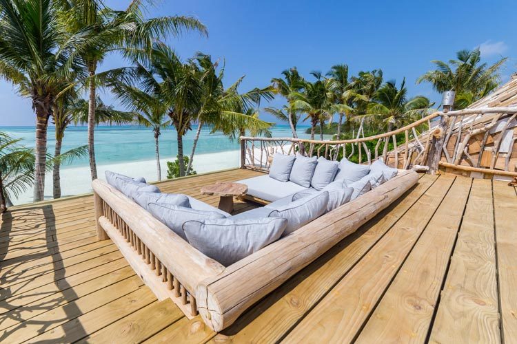 Wayfarers Atlas Luxury Family Surf Resort Soneva Jani Crab Shack lounge with views to the ocean
