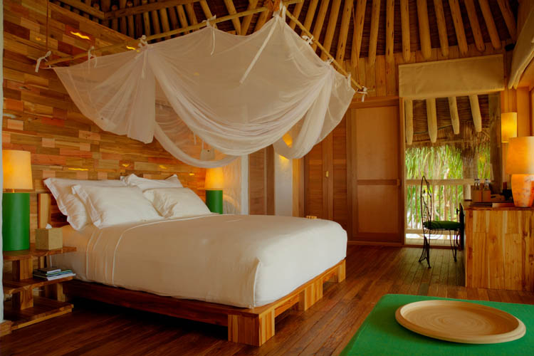 Wayfarers Atlas Soneva Fushi Maldives villa 36 Jungle Reserve bedroom. The perfect family-friendly or group surf holiday destination