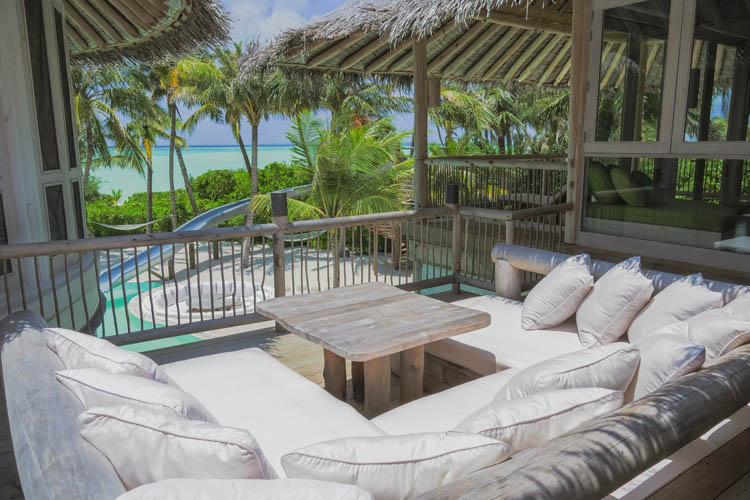 Wayfarers Atlas Luxury Family Surf Resort Soneva Jani 4 Bedroom Island Reserve outdoor lounge with views to the water