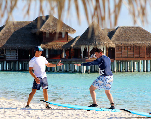 Learn to surf at Anantara Dhigu Maldives