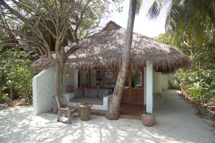 Wayfarers Atlas Soneva Fushi Maldives exterior of soneva fushi villa with pool. The perfect family-friendly surf holiday destination