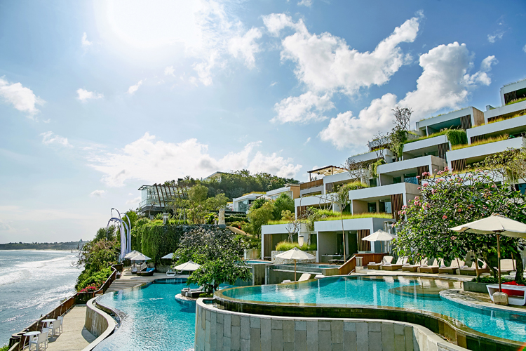 View of Anantara Uluwatu villas and pool a Bali surf resort in Indonesia