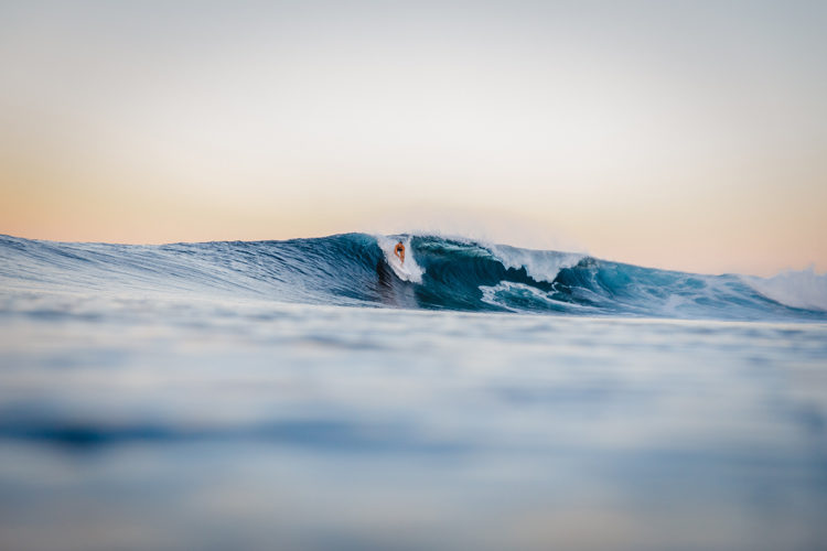 Surfer on a wave at Sinalei Reef Resort & Spa, Samoa