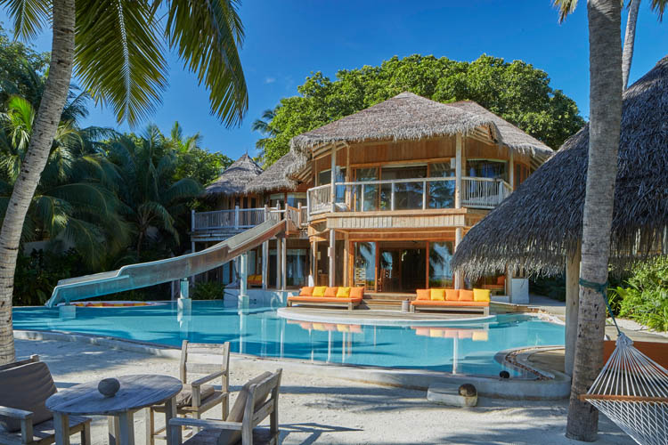 Wayfarers Atlas Soneva Fushi Maldives villa 15 pool and waterslide. The perfect family-friendly or group surf holiday destination