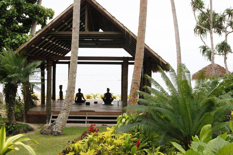 Beachfront yoga pavilion at Qamea Resort and Spa, Fiji best surf holiday location for couples