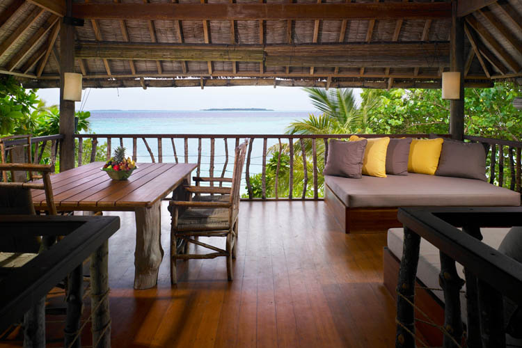 Wayfarers Atlas Soneva Fushi Maldives sunrise villa outdoor dining and lounge. The perfect family-friendly or group surf holiday destination