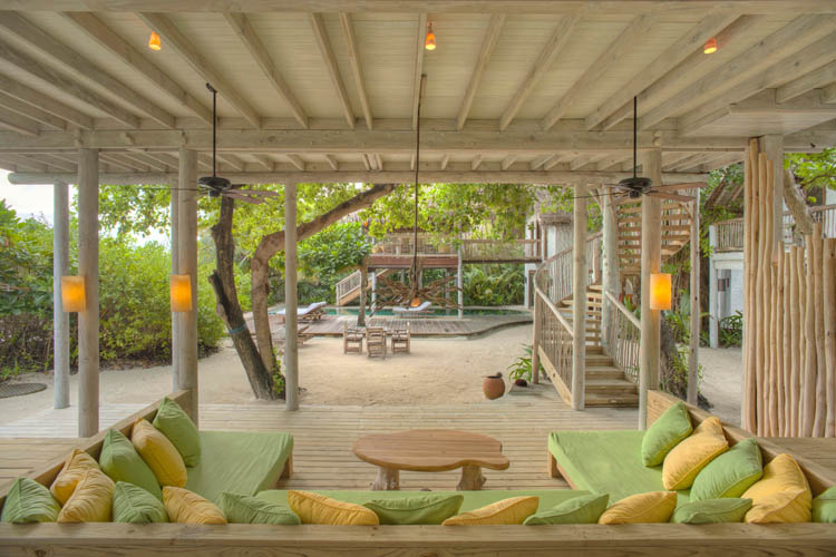 Wayfarers Atlas Soneva Fushi Maldives sunrise villa outdoor lounge. The perfect family-friendly or group surf holiday destination