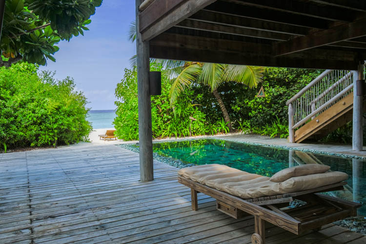 Wayfarers Atlas Soneva Fushi Maldives sunrise villa pool. The perfect family-friendly or group surf holiday destination