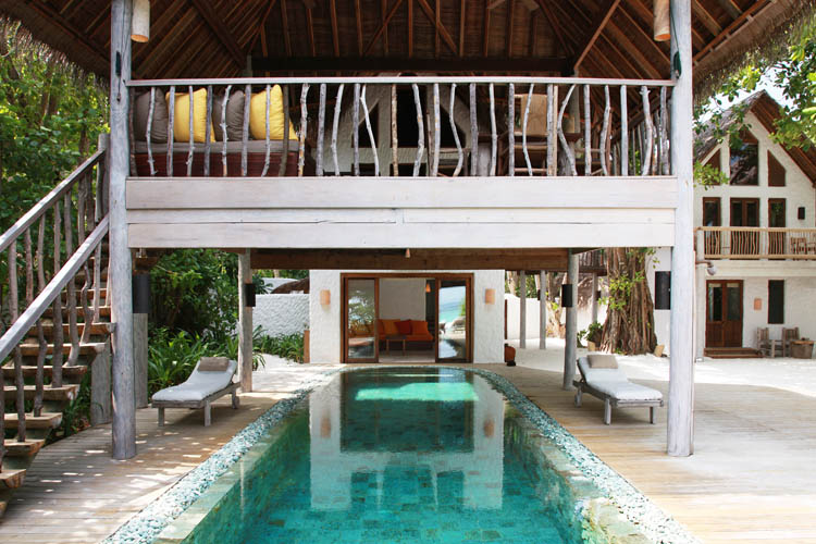 Wayfarers Atlas Soneva Fushi Maldives sunrise villa pool. The perfect family-friendly or group surf holiday destination