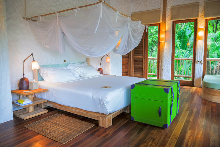 Wayfarers Atlas Soneva Fushi Maldives 9 Bedroom villa bedroom. The perfect family-friendly or group surf holiday destination