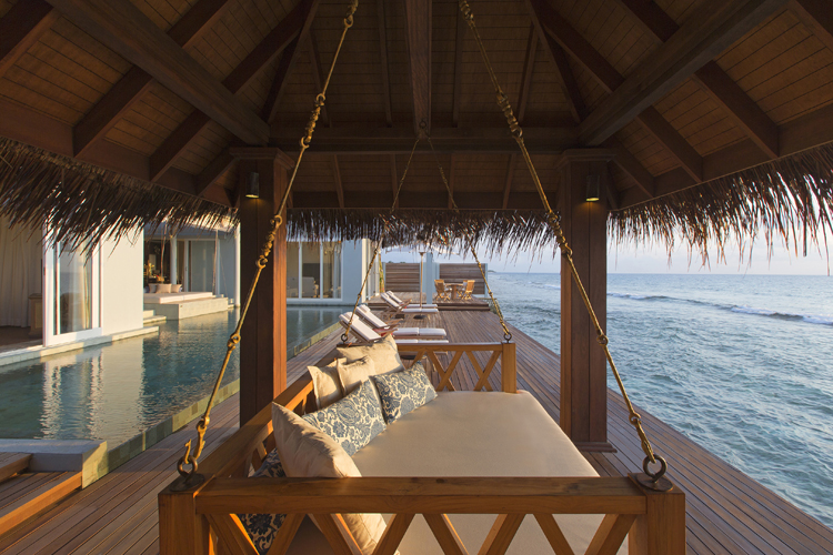 Residence swing overlooking the ocean at Naladhu, Maldives