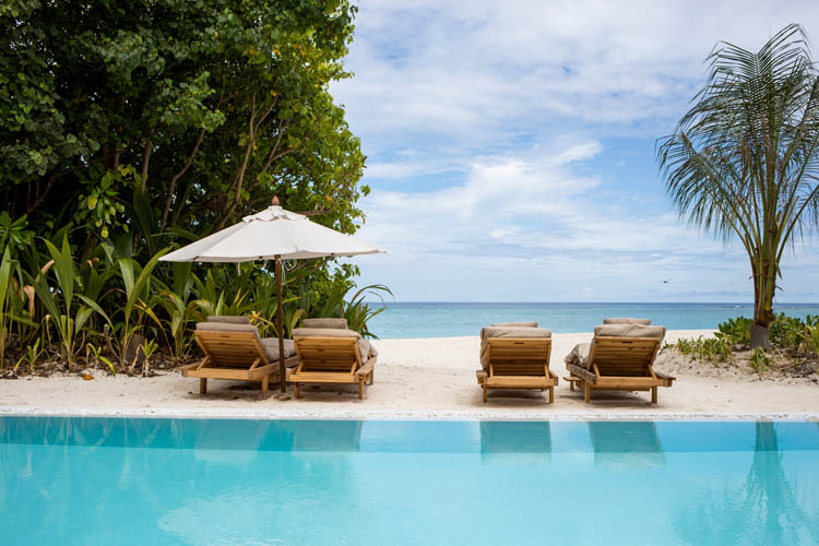 Wayfarers Atlas Soneva Fushi Maldives villa One pool. The perfect family-friendly or group surf holiday destination