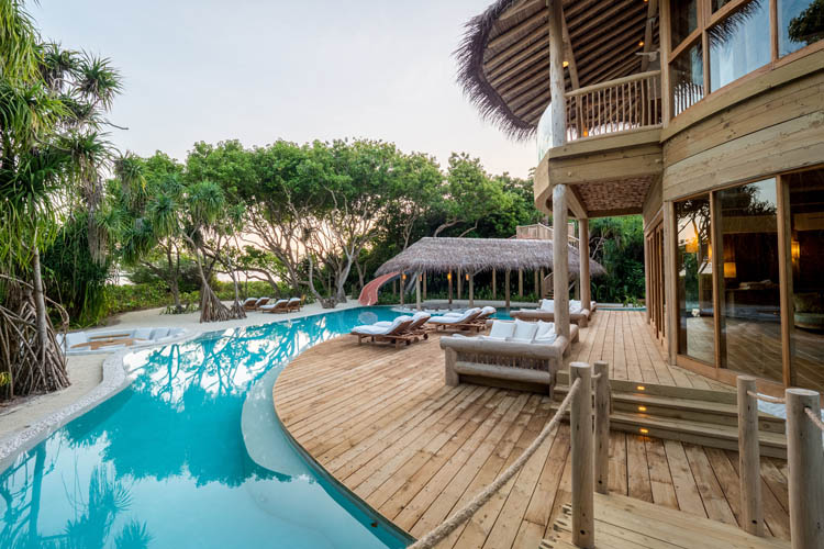 Wayfarers Atlas Soneva Fushi Maldives villa. The perfect family-friendly or group surf holiday destination