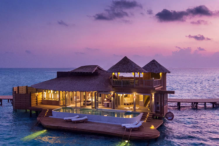 Wayfarers Atlas Luxury Family Surf Resort Soneva Jani Resort 1 Bedroom Water Retreat at sunset