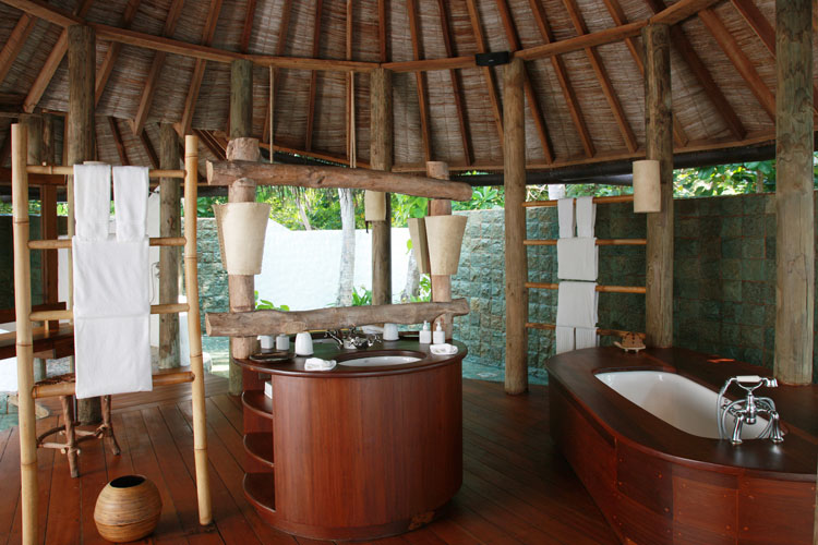 Wayfarers Atlas Soneva Fushi Maldives crusoe suite with pool bathroom. The perfect family-friendly surf holiday destination