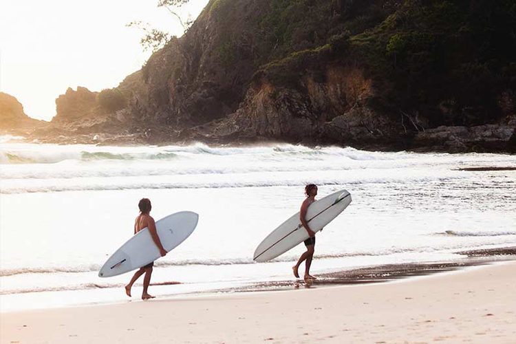 Surfers at Cabarita Beach infront of Halcyon House Australian Surf Resort