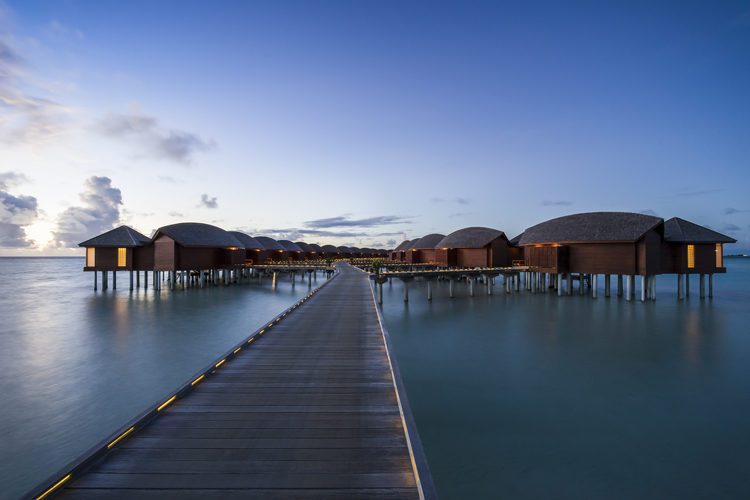 Anantara Dhigu view of overwater suites Maldives Surf Resort