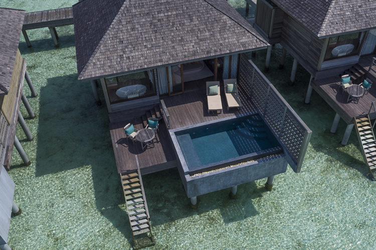 Anantara Veli exterior of deluxe overwater bungalow with pool