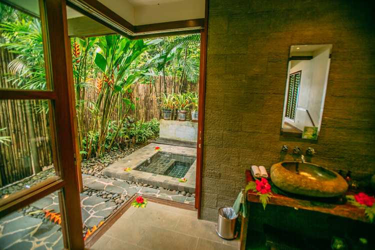Honeymoon bure bathroom and jacuzzi at Qamea Resort and Spa Fiji