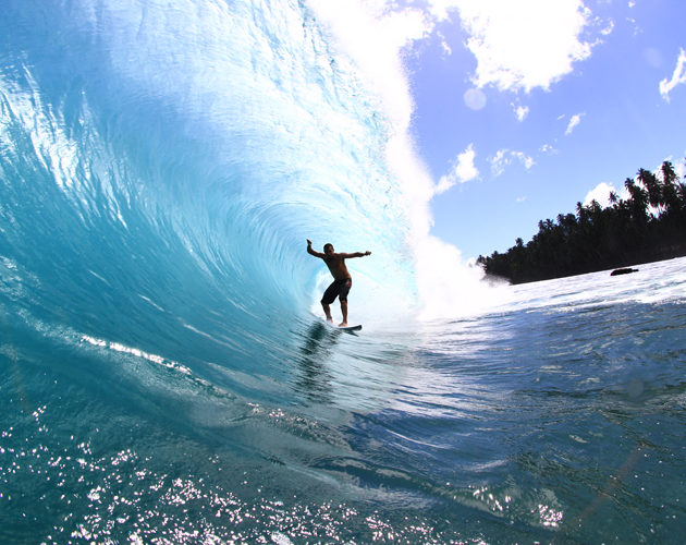 surfer getting barrelled Resort Latitude Zero