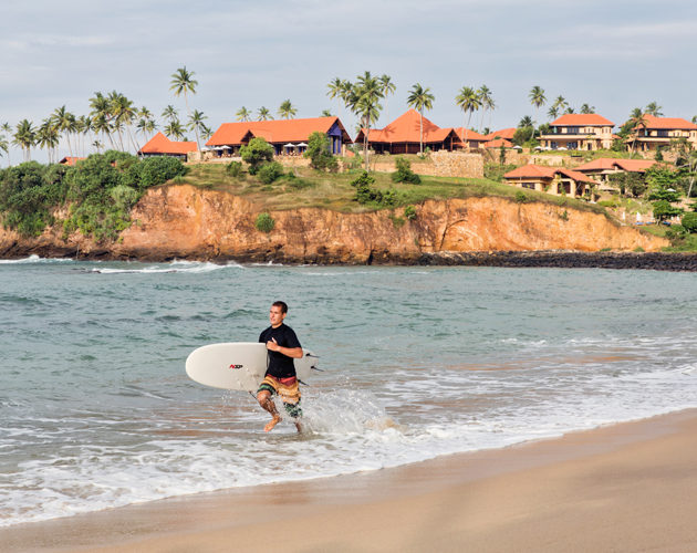 surfer at Cape Weligama Sri Lanka