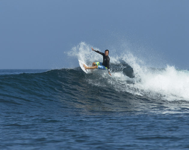 Surfer enjoying one of the many waves on offer near Four Seasons Jimbaran Bay Bali