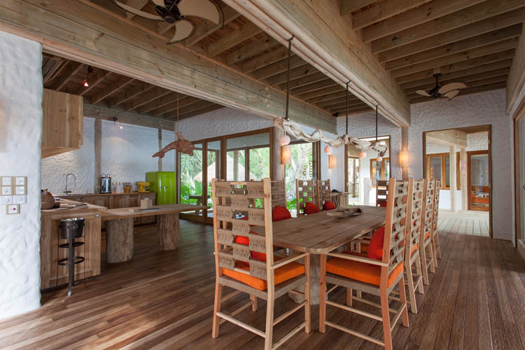 Wayfarers Atlas Soneva Fushi Maldives villa 14 dining room. The perfect family-friendly or group surf holiday destination