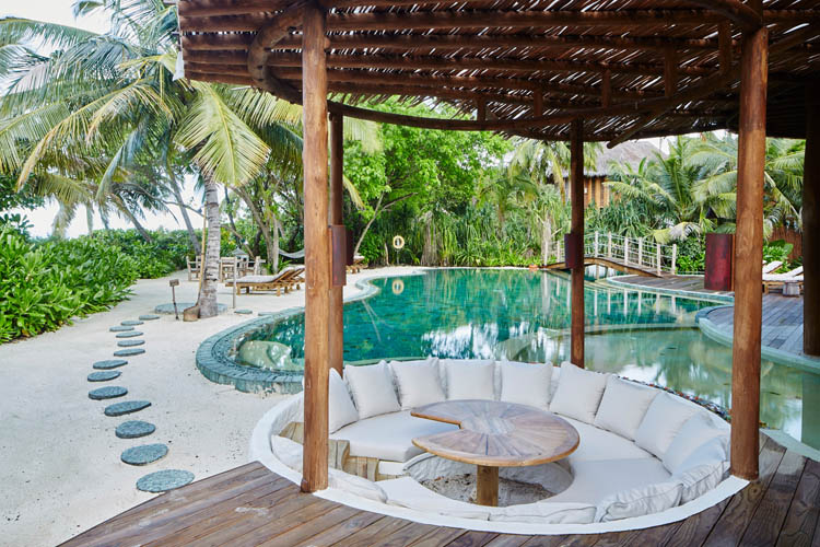 Wayfarers Atlas Soneva Fushi Maldives villa 42 pool and outdoor lounge. The perfect family-friendly or group surf holiday destination