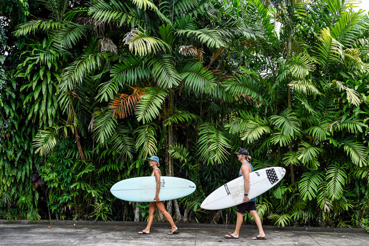 Couple going surfing at Sinalei Reef Resort & Spa, Samoa