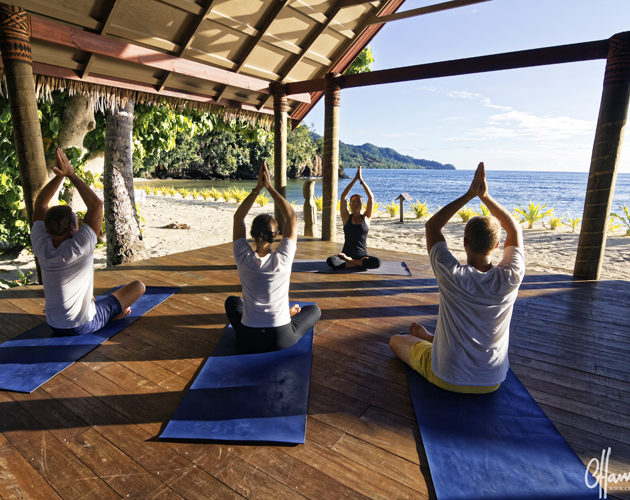 Guests doing Yoga at Qamea Island, Fiji